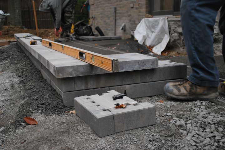 a level on a stack of concrete blocks